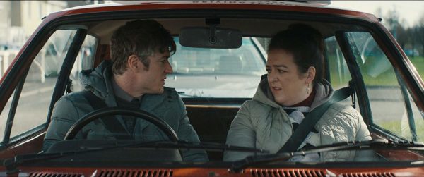 Barry Ward and Maeve Higgins sit in a car
