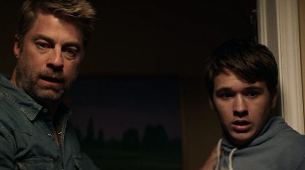 Liam (Jamison Jones) and Ben (John-Paul Howard) stare in shock at something