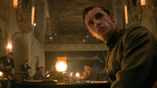 A man in uniform sitting at a table