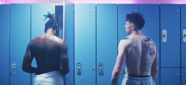 Jules (L) and Preston (R) half naked in a locker room
