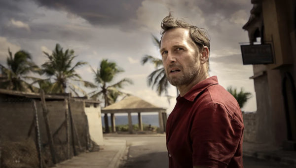 Paul Sturges (Josh Lucas) looks on as a storm approaches the beach