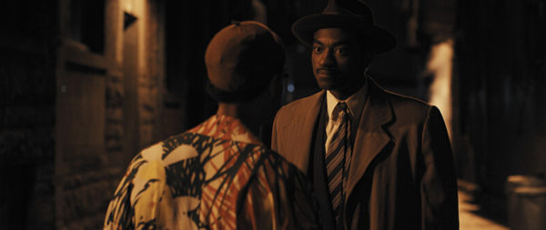 Frankie (Noah J. Ricketts - facing away from the camera) speaks with Marcus (Jelani Alladin)