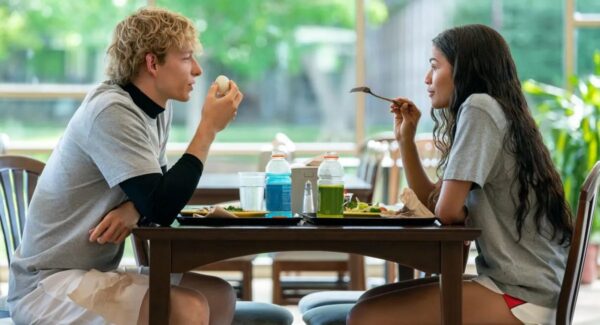 Mike Faist (L) and Zendaya (R) eating in Challengers
