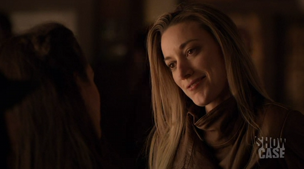 Lauren (Zoie Palmer) offers a shoulder to Bo (Anna Silk) in the aftermath o...