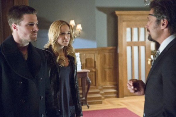 Oliver (Stephen Amell) and Sara (Caity Lotz) are reunited with Slade (Manu Bennett) in Arrow 2x15
