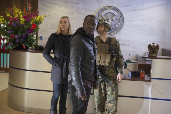 Kate (Yvonne Strahovski) and Erik (Gbenga Akinnagbe) arrive at the US Embassy in '2:00pm-3:00pm'