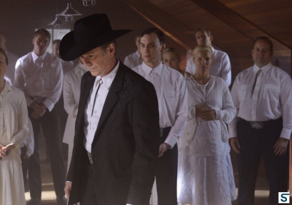 Johanssen (Peter Outerbridge) gathers his flock for a wedding in 'Mingling Its Own Nature With It'