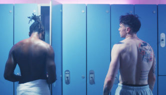 Jules (L) and Preston (R) half naked in a locker room