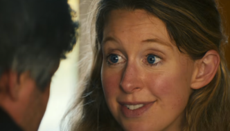A close up of a blonde woman's earnest face